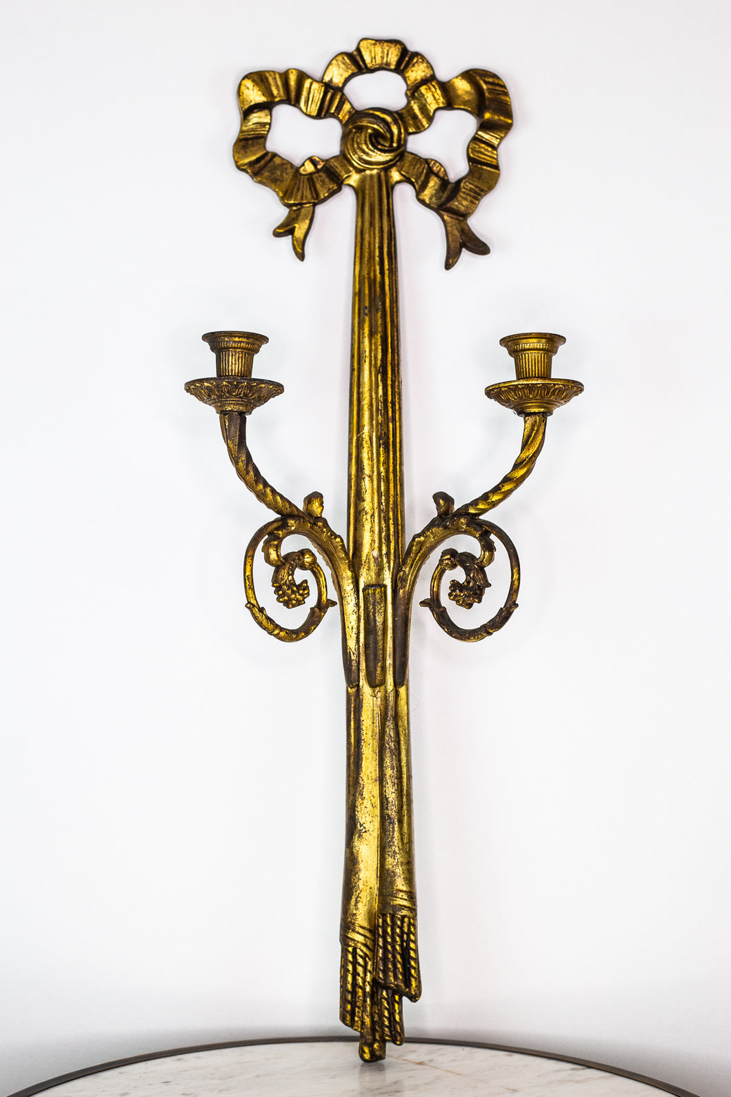 Gold metal candle sconce - single piece